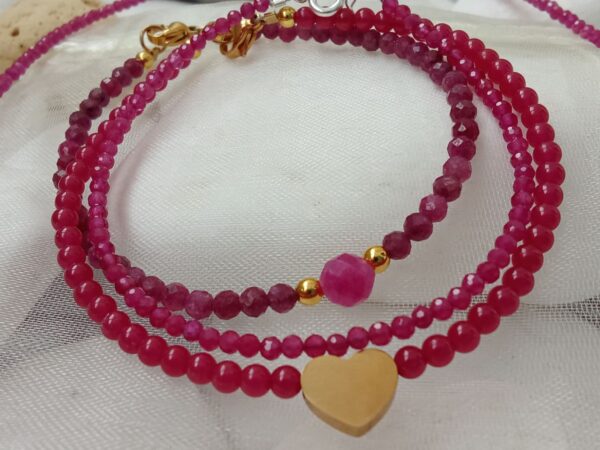 Bracelet of raspberry red Ruby 3mm balls, polished with a heart of steel